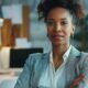 in a sleek, modern office adorned with blueprints and financial documents, a confident female financial advisor engages with diverse clients, embodying empowerment and innovation, while the phrase ‘think outside the bank’ elegantly highlights the atmosphere of flexible real estate investment strategies.