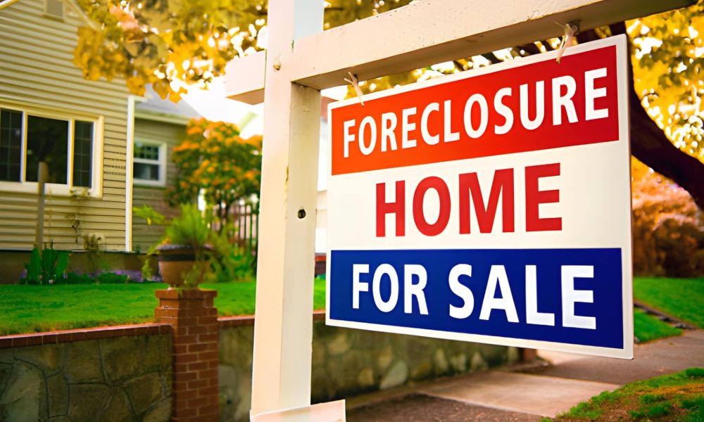 Foreclosure sign in front of house—foreclosed homes in Florida offer value for buyers and investors.